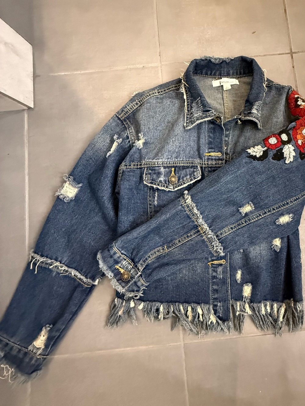Embroidered Distressed Denim Jacket in Blue with Red Floral Accents - Picture 7 of 8